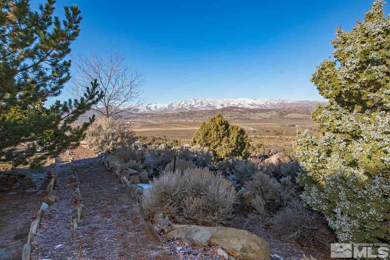 100 Boron Lane Reno, NV 89506 - Photo 23 of 25 a view of a lake with a mountain