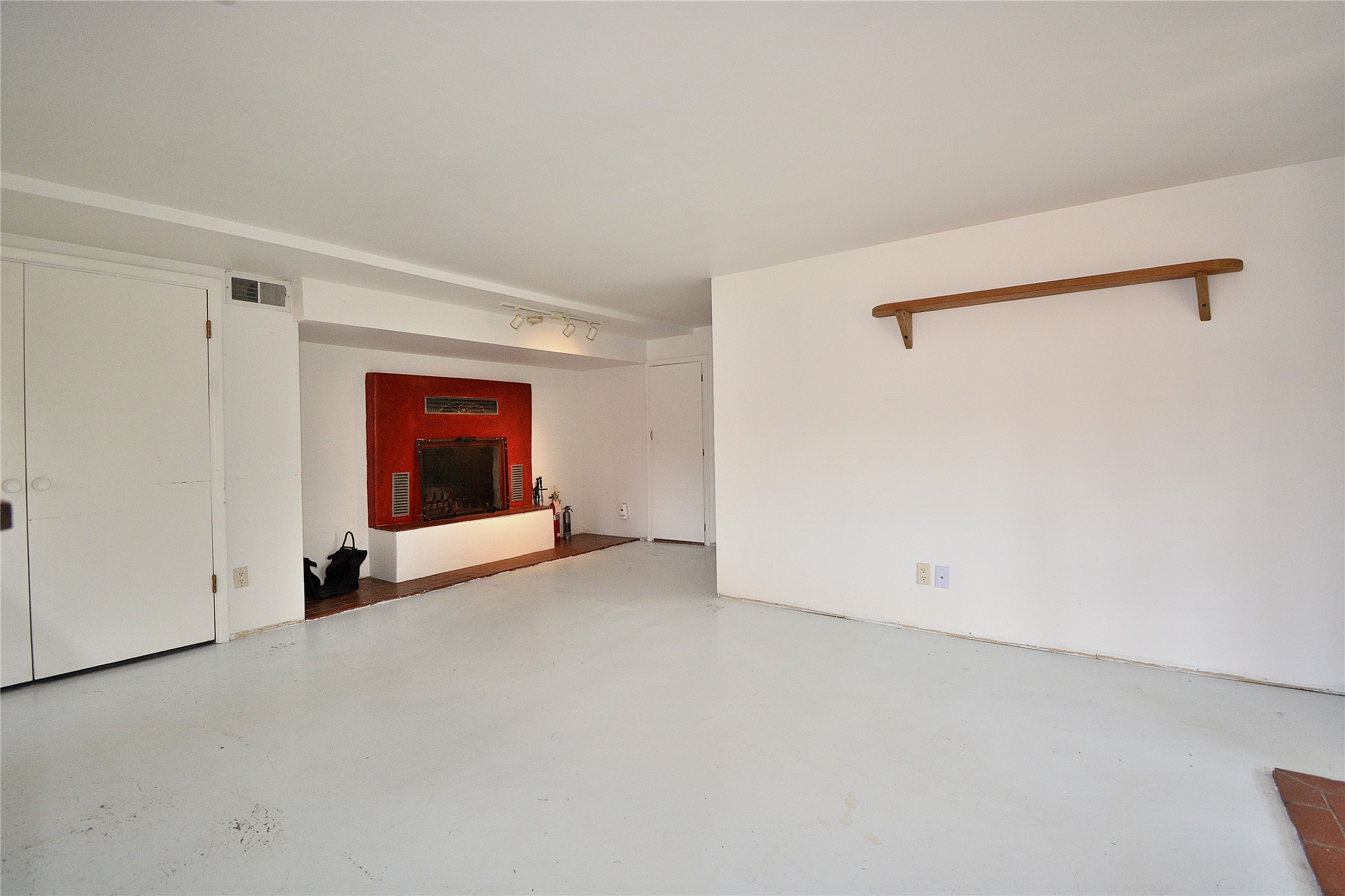 904 Bishops Lodge Road Santa Fe, NM 87501 - Photo 37 of 51 Downstairs apartment living room and fireplace