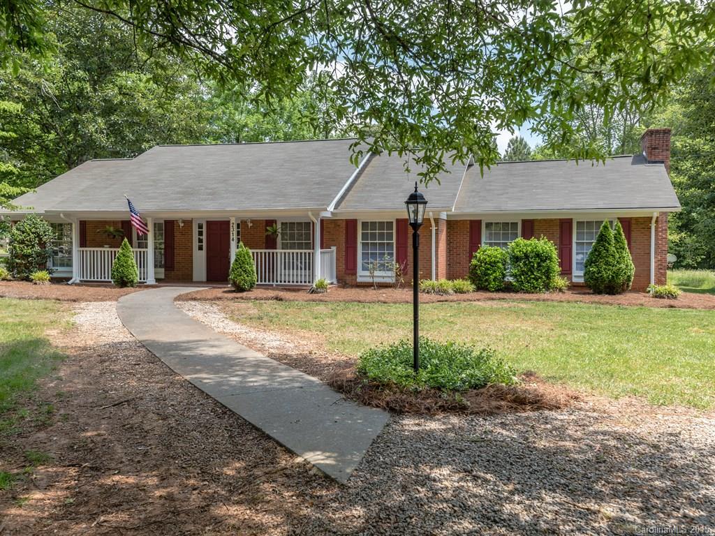 2314 Goldmine Road Monroe, NC 28110 - Photo 1 of 24 a front view of house with yard and green space