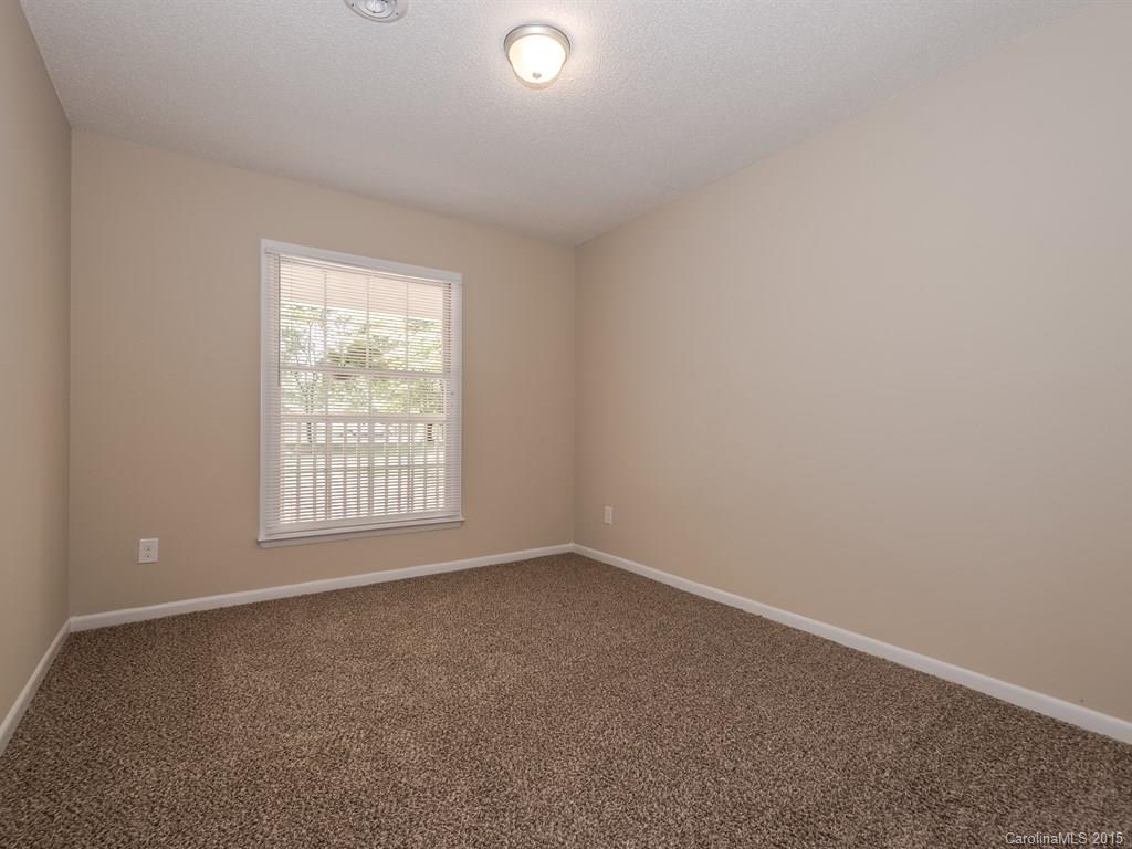 2314 Goldmine Road Monroe, NC 28110 - Photo 18 of 24 an empty room with a window