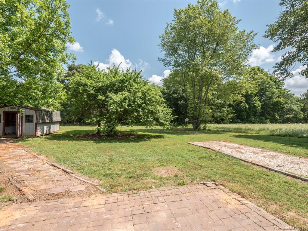 2314 Goldmine Road Monroe, NC 28110 - Photo 21 of 24 a view of a house with a yard