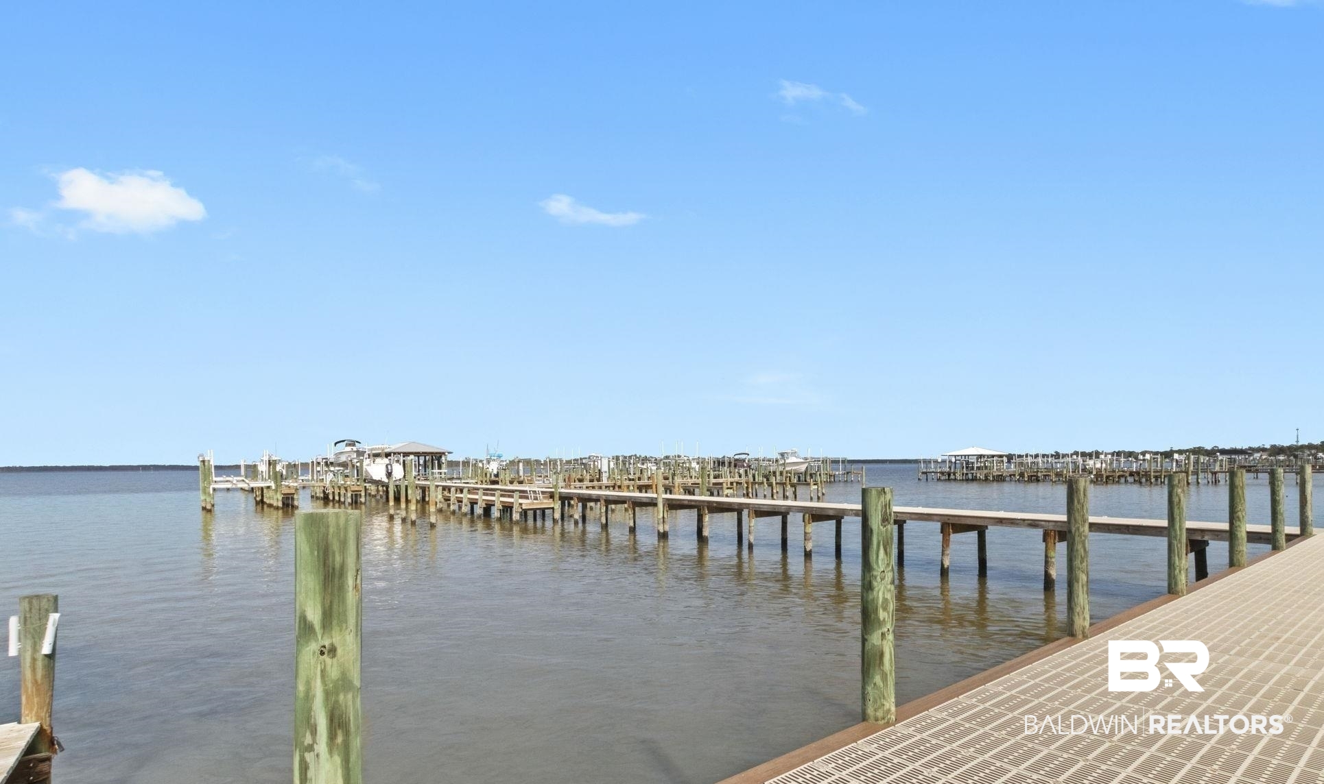 25861 Canal Road, Unit 77 Orange Beach, AL 36561 - Photo 44 of 48 Dock area with a water view