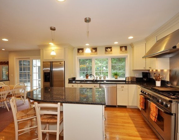 420 Depot Road Boxborough, MA 01719 - Photo 8 of 30 a large kitchen with stainless steel appliances granite countertop a stove and a sink
