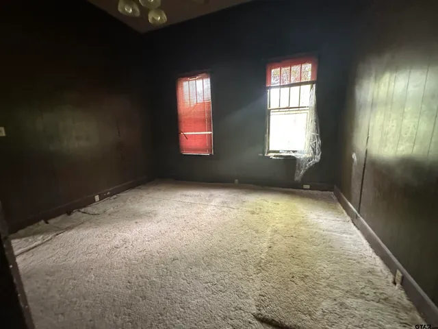 a bathroom with a toilet and a sink