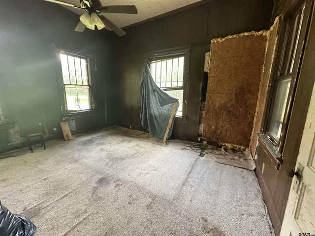 a view of a backyard of the house