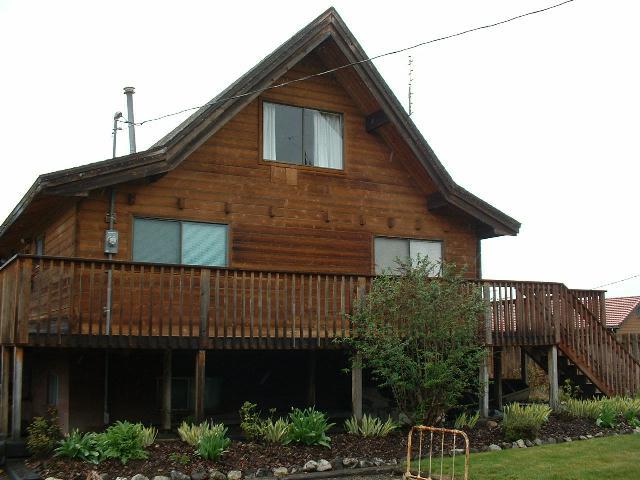 51 Sand Hill Road Grandview, WA 98930 - Photo 2 of 7 a front view of a house with garden