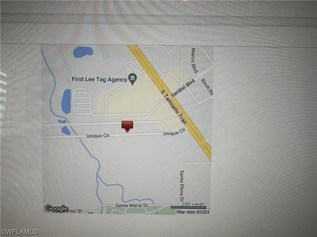 3634 Unique Circle Fort Myers, FL 33908 - Photo 6 of 10 a utility room with a door