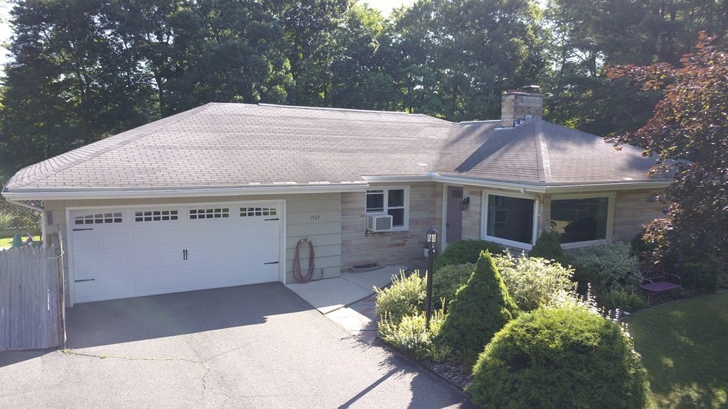 1929 Allen Street Springfield, MA 01118 - Photo 1 of 38 a front view of a house with a yard