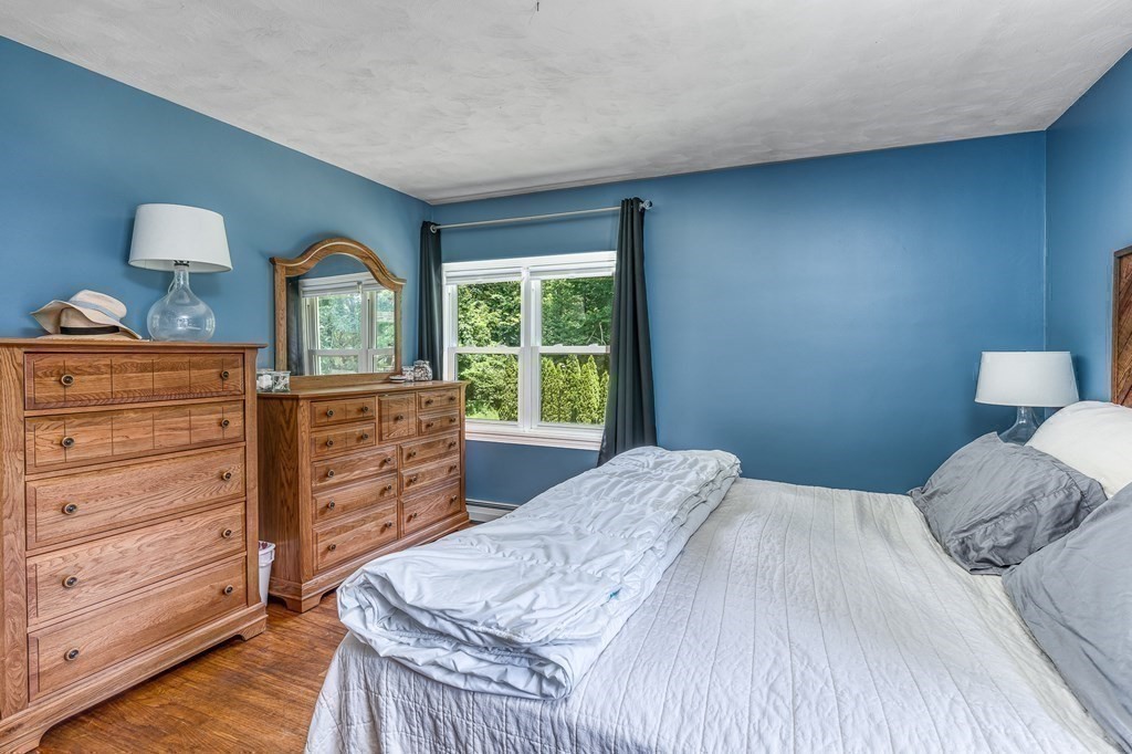 1929 Allen Street Springfield, MA 01118 - Photo 20 of 38 a bedroom with a bed and a dresser