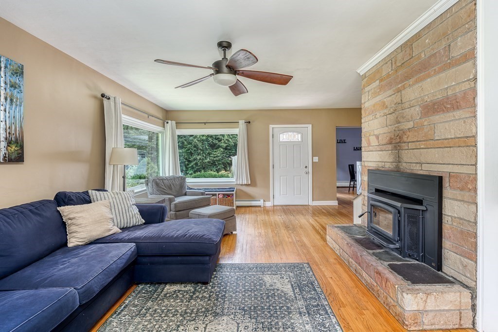 1929 Allen Street Springfield, MA 01118 - Photo 5 of 38 a living room with furniture and a fireplace