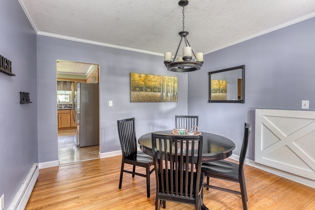 1929 Allen Street Springfield, MA 01118 - Photo 10 of 38 a view of a dining room with furniture and chandelier