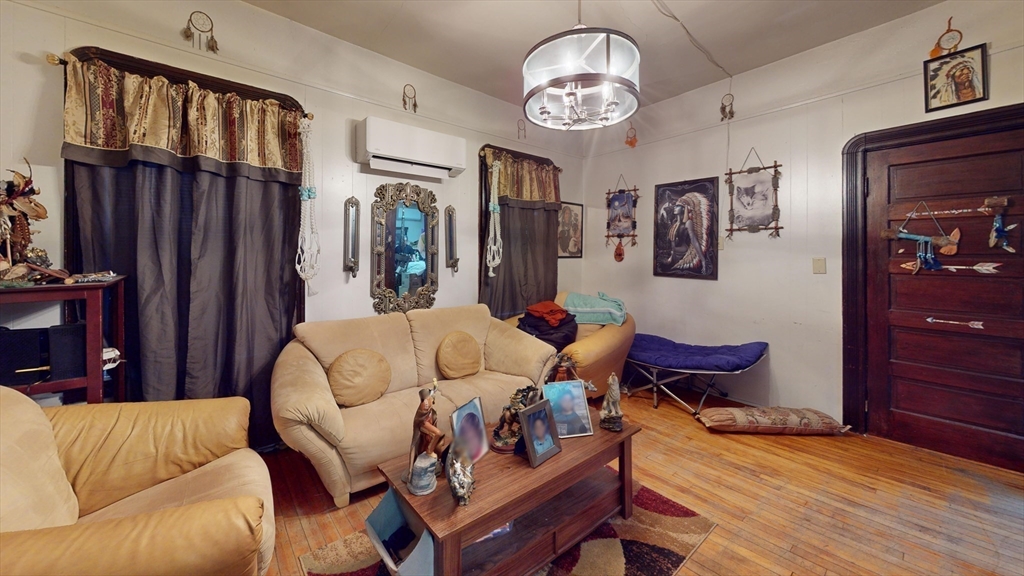 51 Uxbridge Street Worcester, MA 01605 - Photo 11 of 33 a living room with furniture