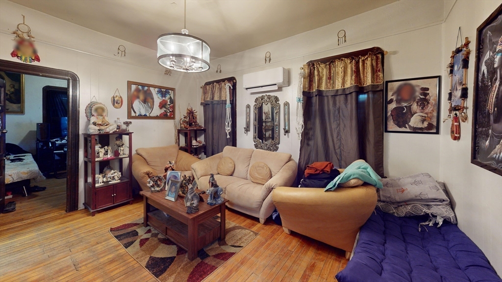 51 Uxbridge Street Worcester, MA 01605 - Photo 12 of 33 a living room with furniture