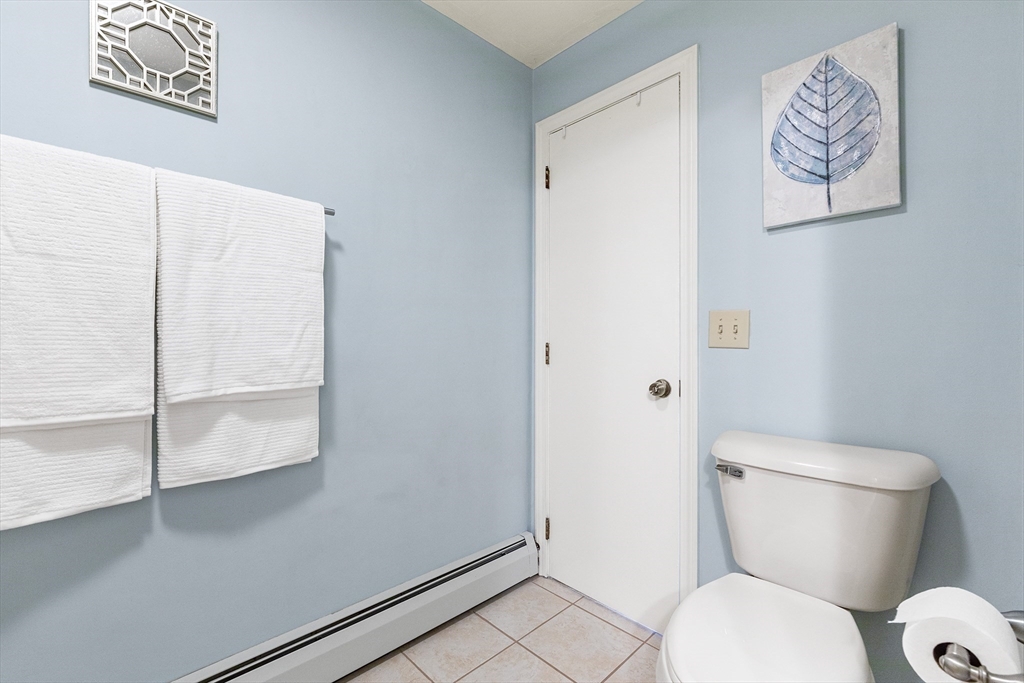 6 Crestlan Drive Worcester, MA 01604 - Photo 22 of 33 a white toilet sitting next to a shower