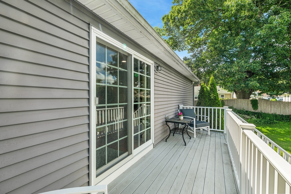 6 Crestlan Drive Worcester, MA 01604 - Photo 29 of 33 a view of a chair and table on the wooden deck
