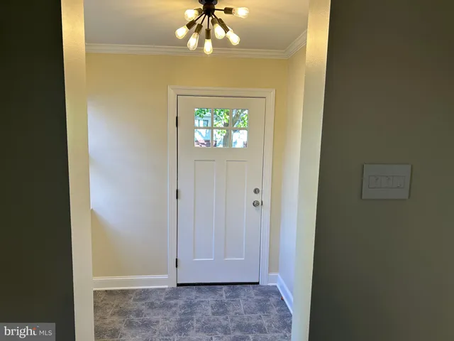 a kitchen with stainless steel appliances granite countertop a refrigerator sink and cabinets