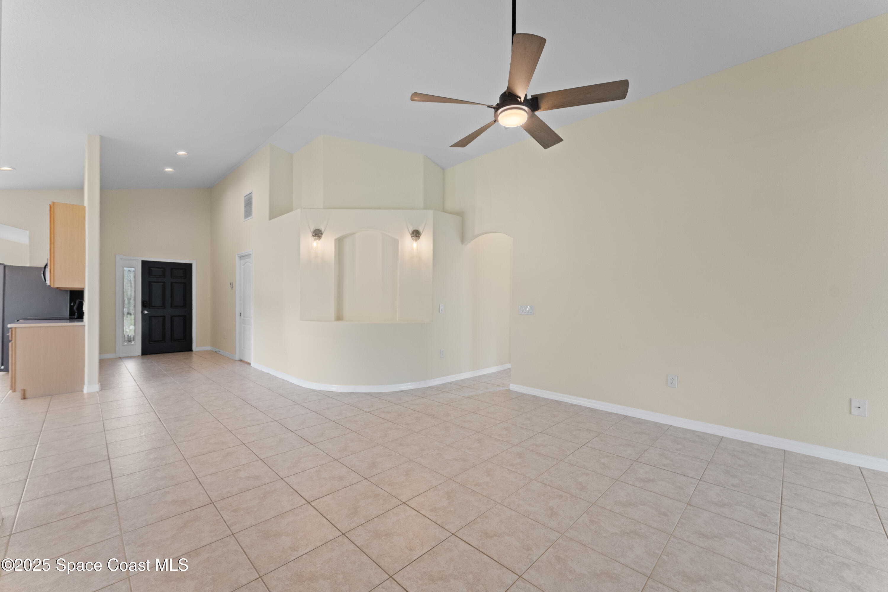 3112 Siderwheel Drive Rockledge, FL 32955 - Photo 14 of 60 an empty room with closet and windows
