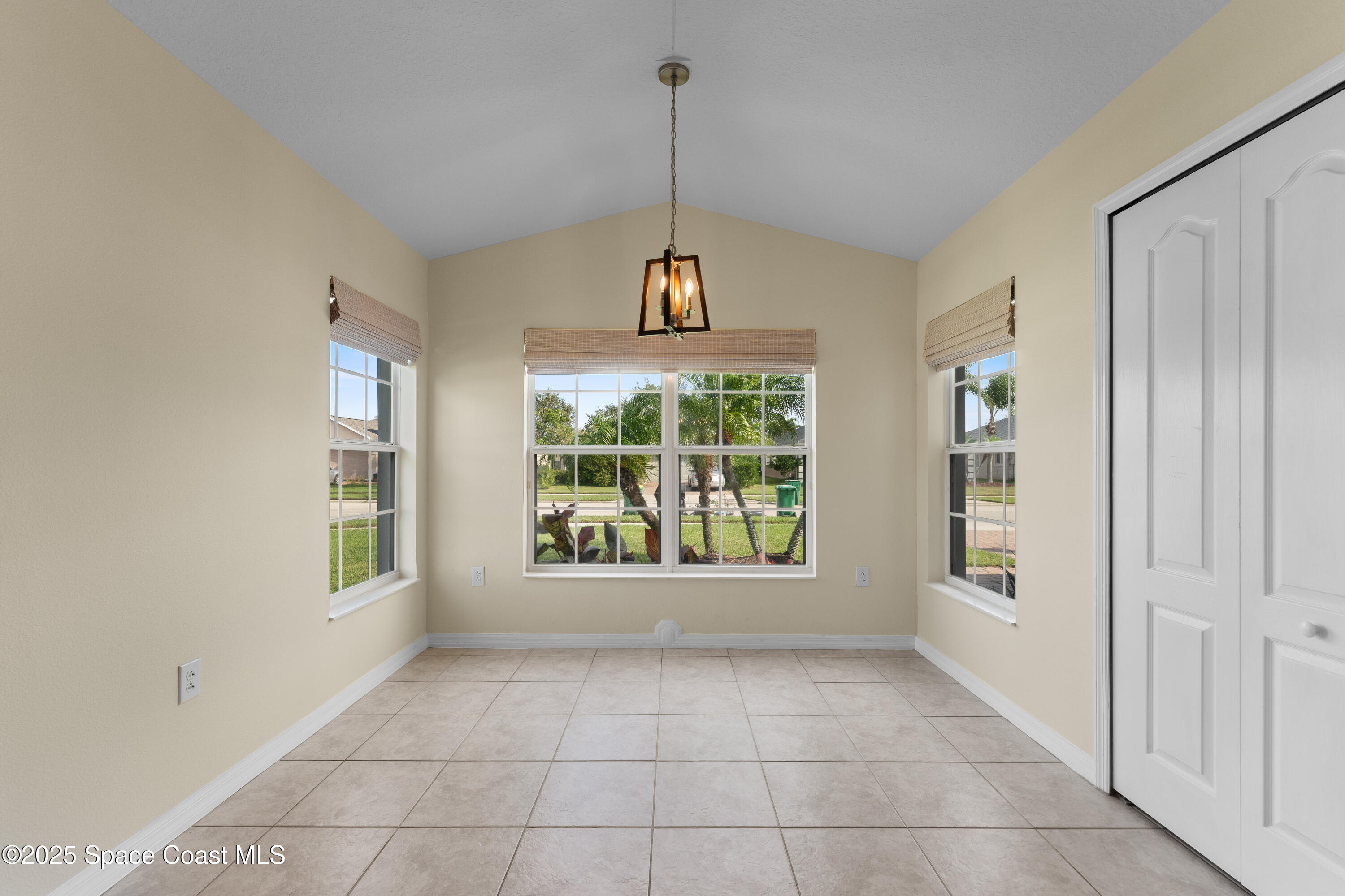 3112 Siderwheel Drive Rockledge, FL 32955 - Photo 21 of 60 a view of an empty room with a window