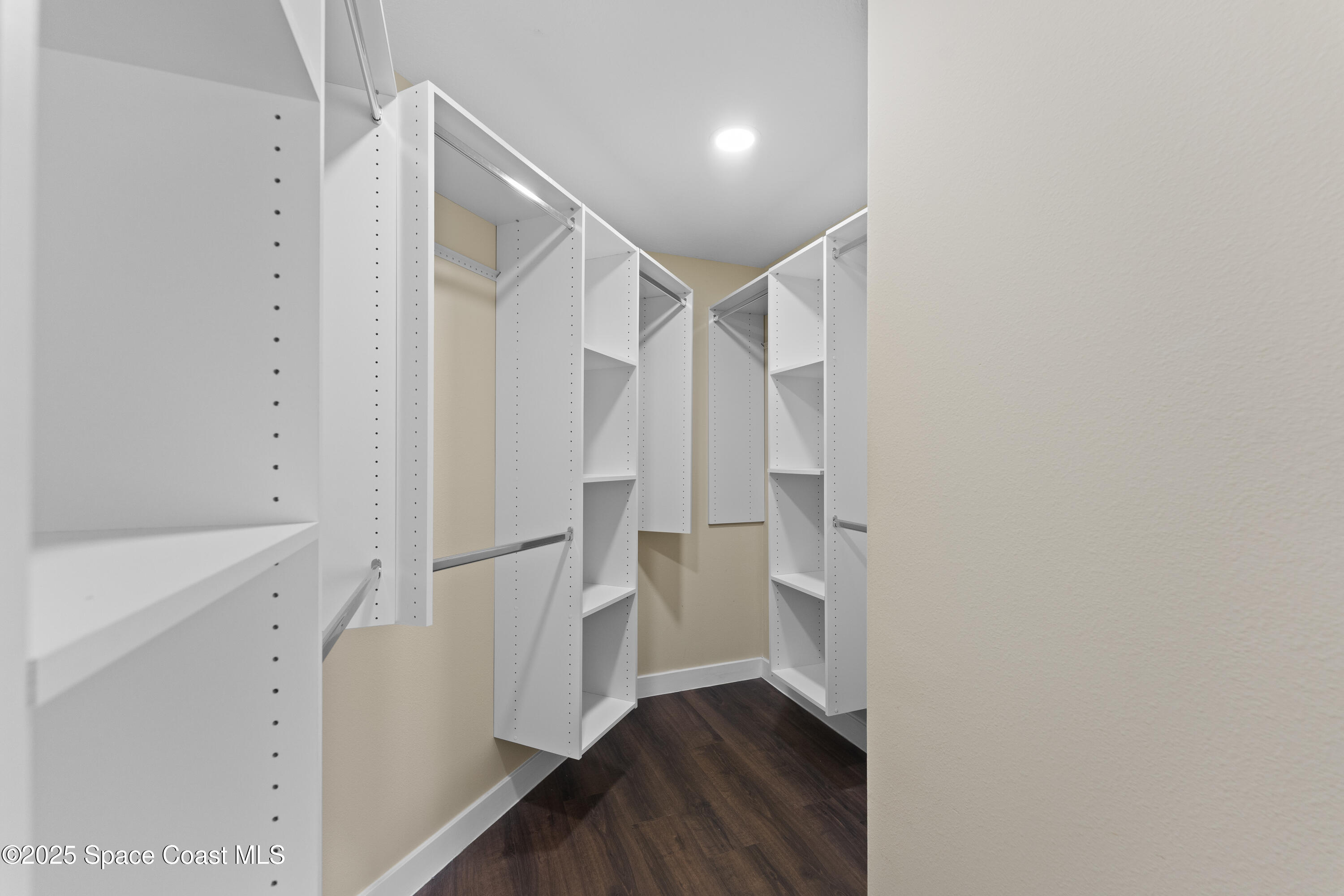 3112 Siderwheel Drive Rockledge, FL 32955 - Photo 26 of 60 a view of entryway with stairs and wooden floor