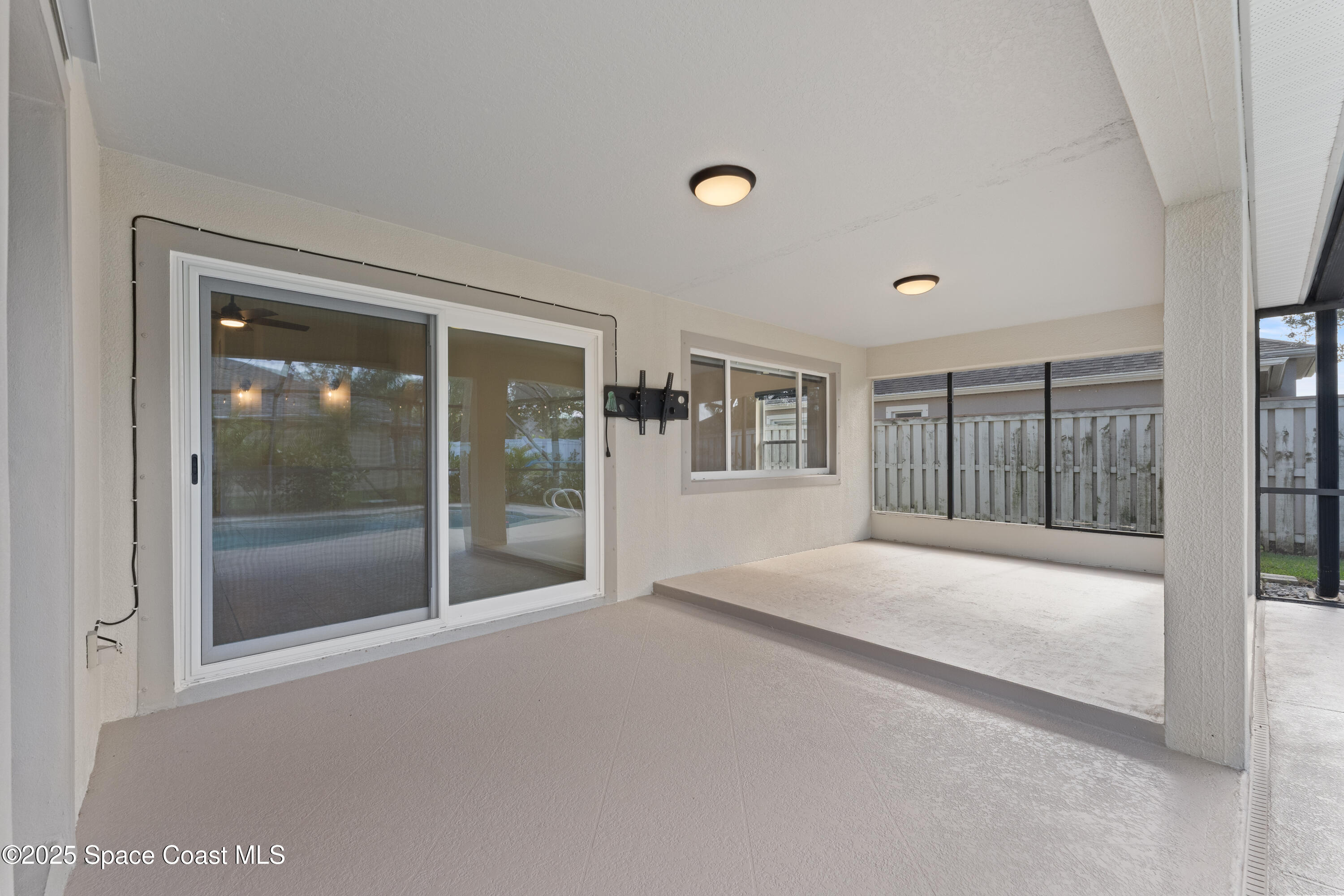 3112 Siderwheel Drive Rockledge, FL 32955 - Photo 35 of 60 a bedroom with furniture and large window