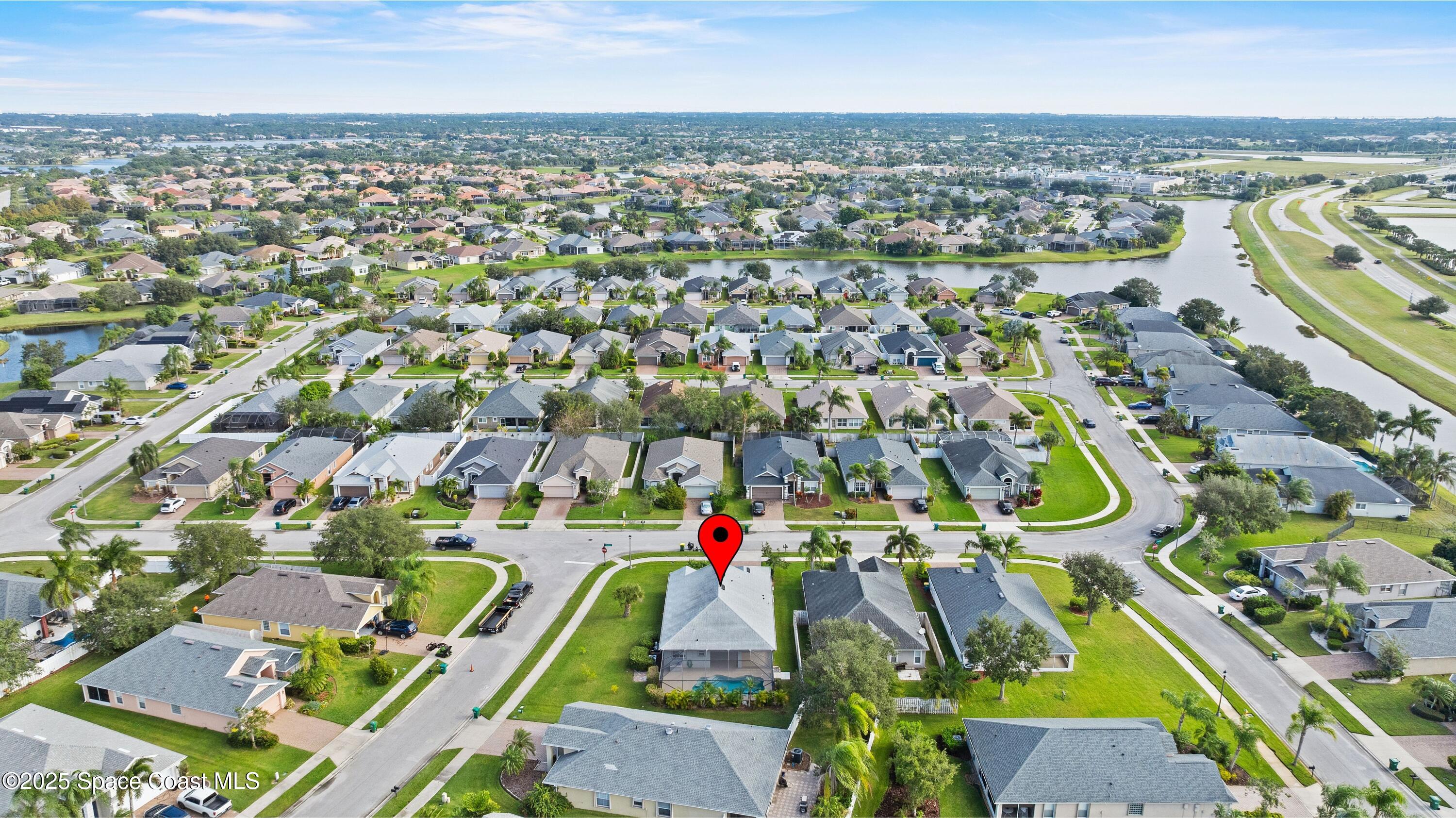 3112 Siderwheel Drive Rockledge, FL 32955 - Photo 44 of 60 an aerial view of residential houses with outdoor space