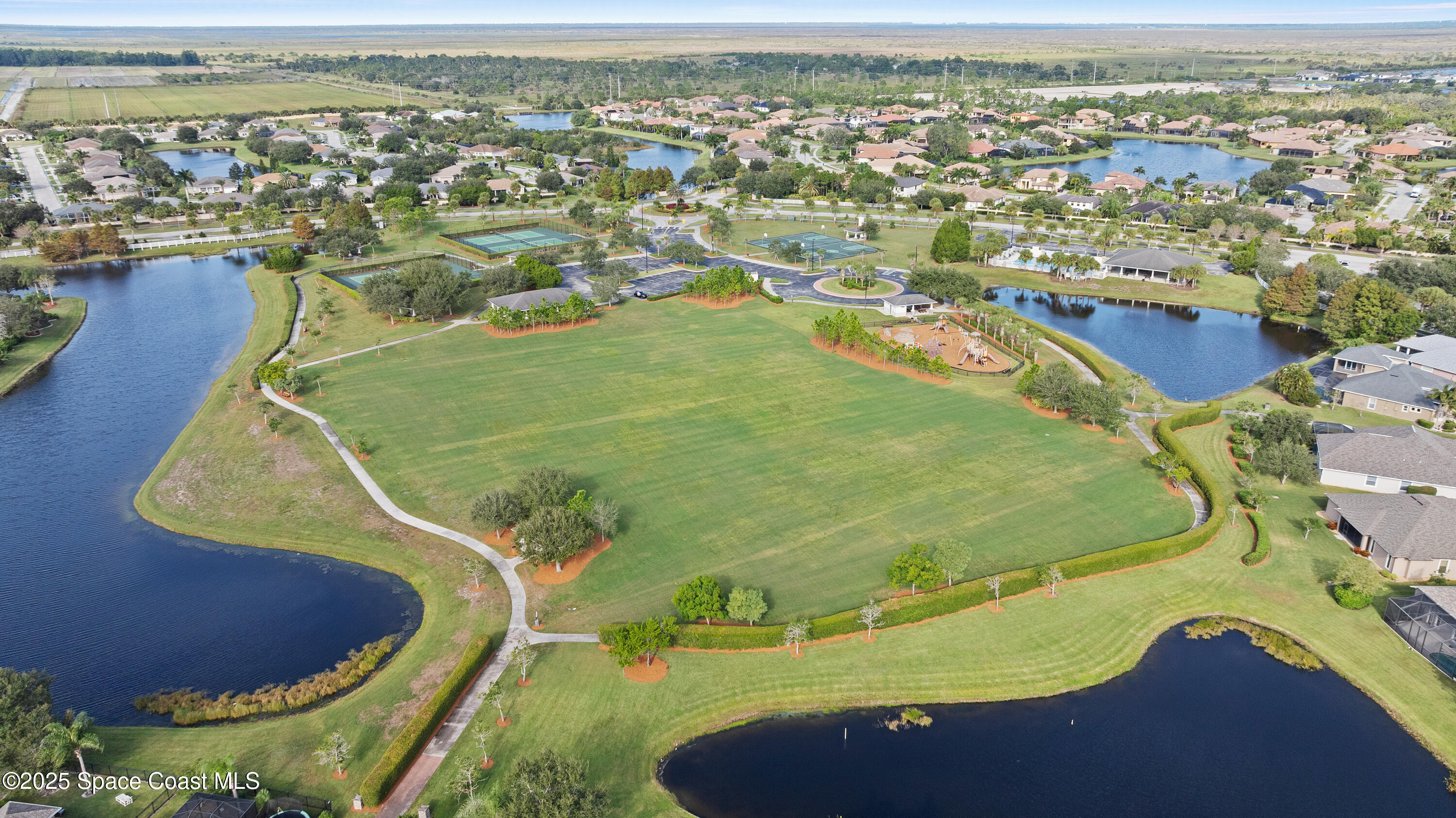 3112 Siderwheel Drive Rockledge, FL 32955 - Photo 46 of 60 an aerial view of residential houses with outdoor space