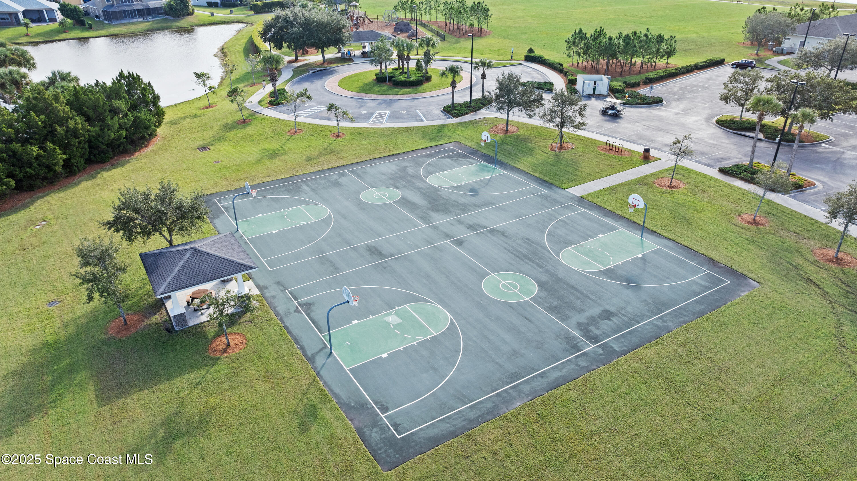 3112 Siderwheel Drive Rockledge, FL 32955 - Photo 48 of 60 a view of a swimming pool with a yard