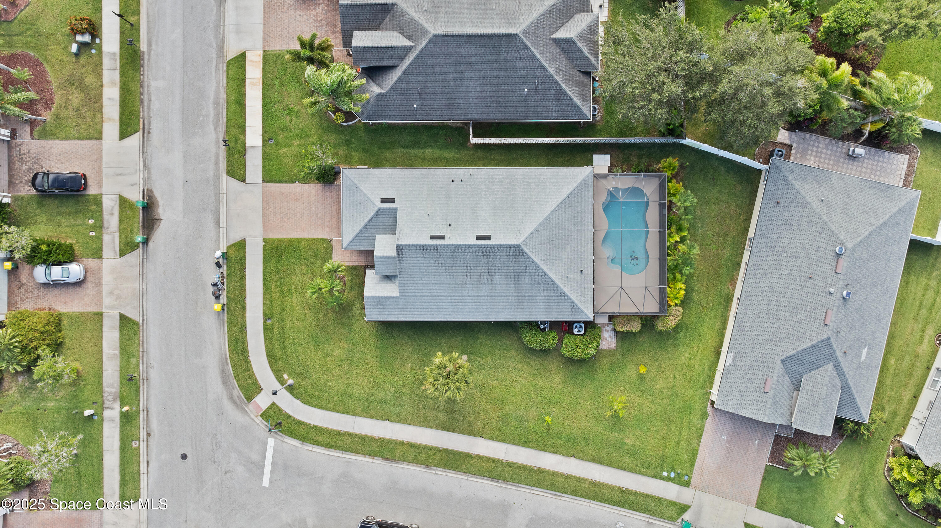 3112 Siderwheel Drive Rockledge, FL 32955 - Photo 59 of 60 an aerial view of a house with swimming pool garden and patio