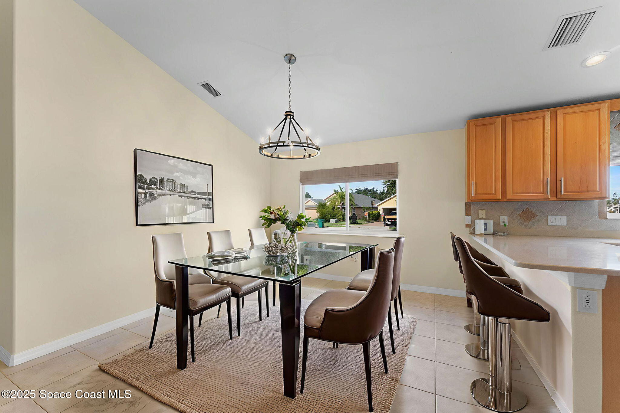3112 Siderwheel Drive Rockledge, FL 32955 - Photo 7 of 60 a dining room with furniture and window