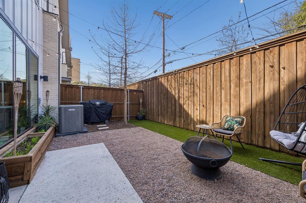 2357 Rook Drive Dallas, TX 75211 - Photo 28 of 28 a backyard of a house with outdoor seating