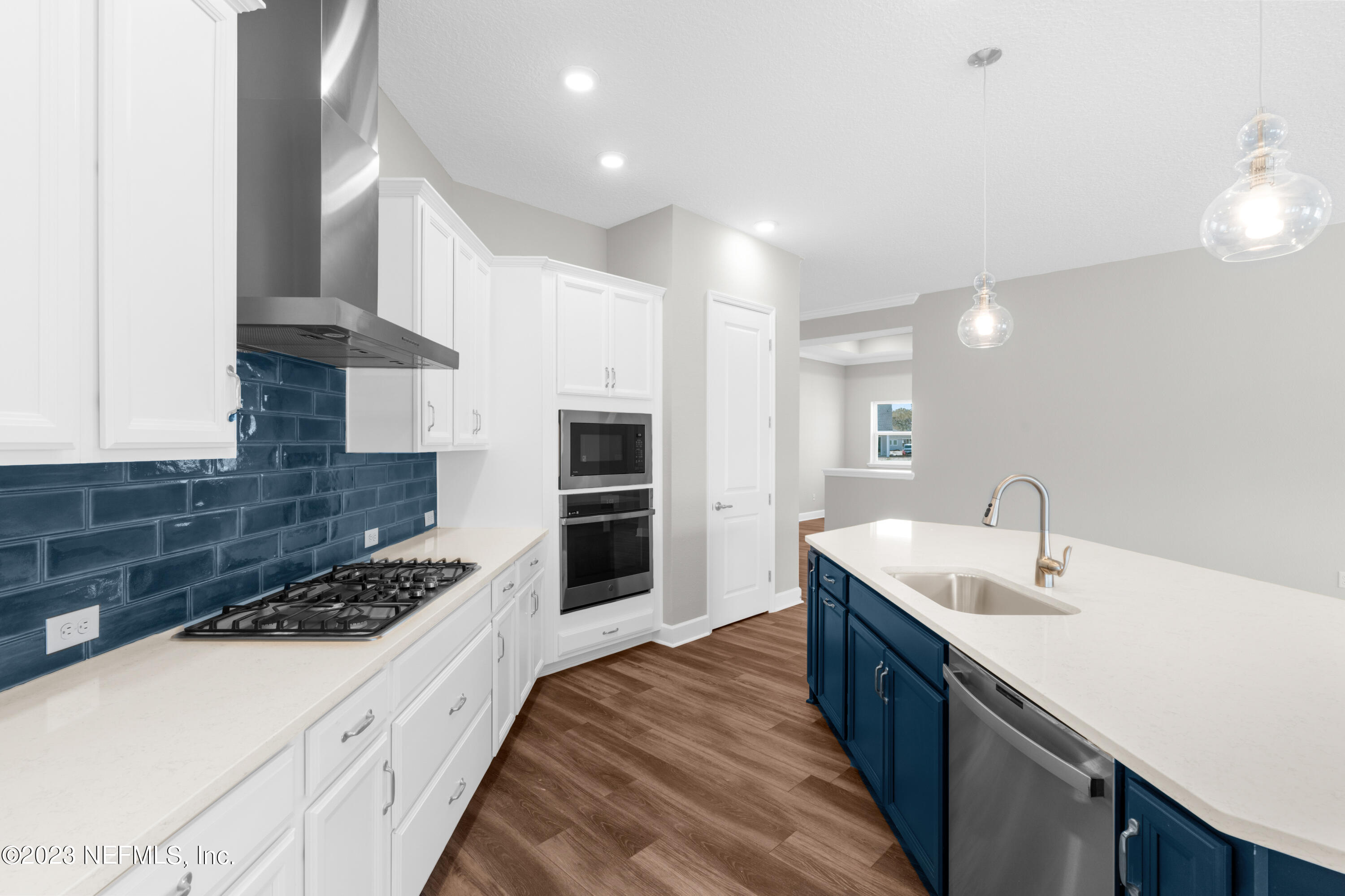 21 Willow Island Point St. Augustine, FL 32092 - Photo 4 of 14 a kitchen with a sink stove and cabinets