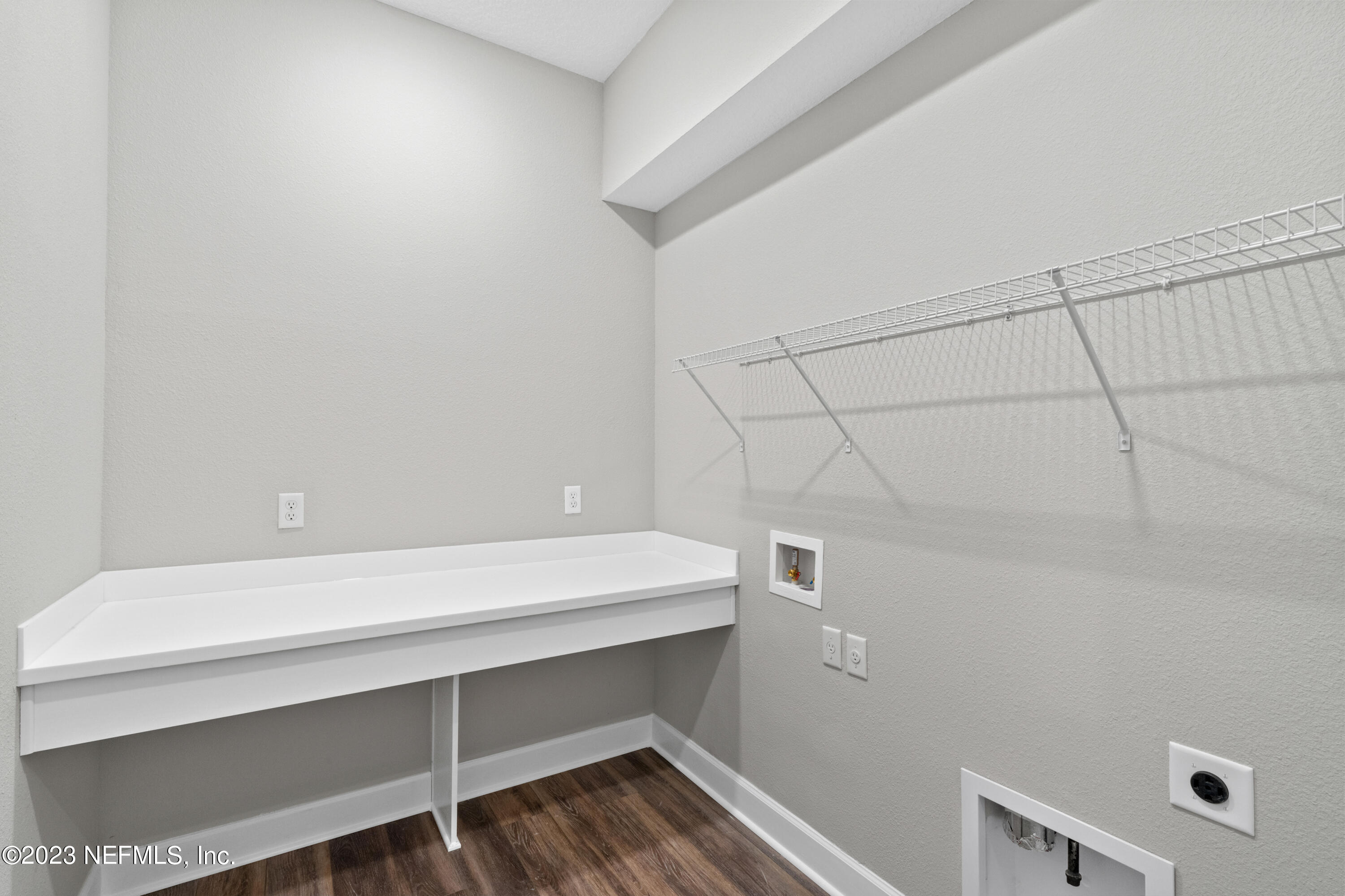 21 Willow Island Point St. Augustine, FL 32092 - Photo 9 of 14 a view of storage and utility room with racks on wall