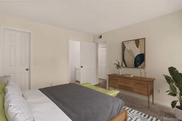 a bedroom with a bed and furniture