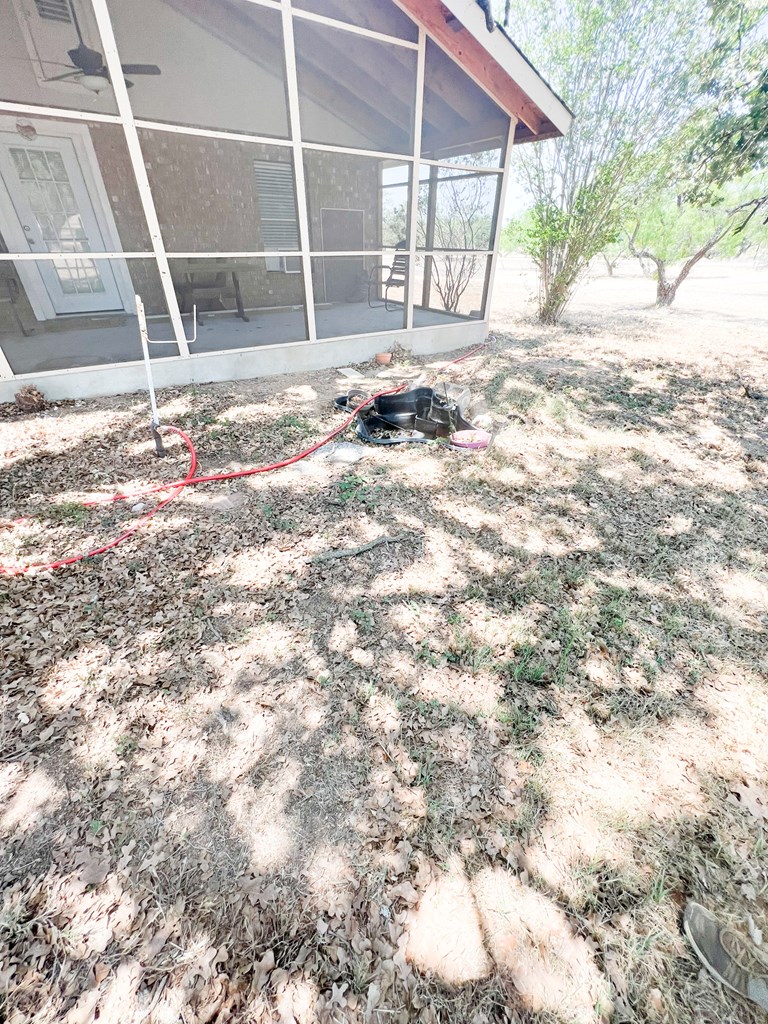 110 Cortez Buchanan Dam, TX 78609 - Photo 5 of 17 a view of empty room with a large window