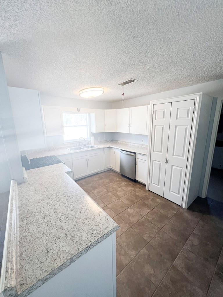 110 Cortez Buchanan Dam, TX 78609 - Photo 10 of 17 a view of kitchen and empty room