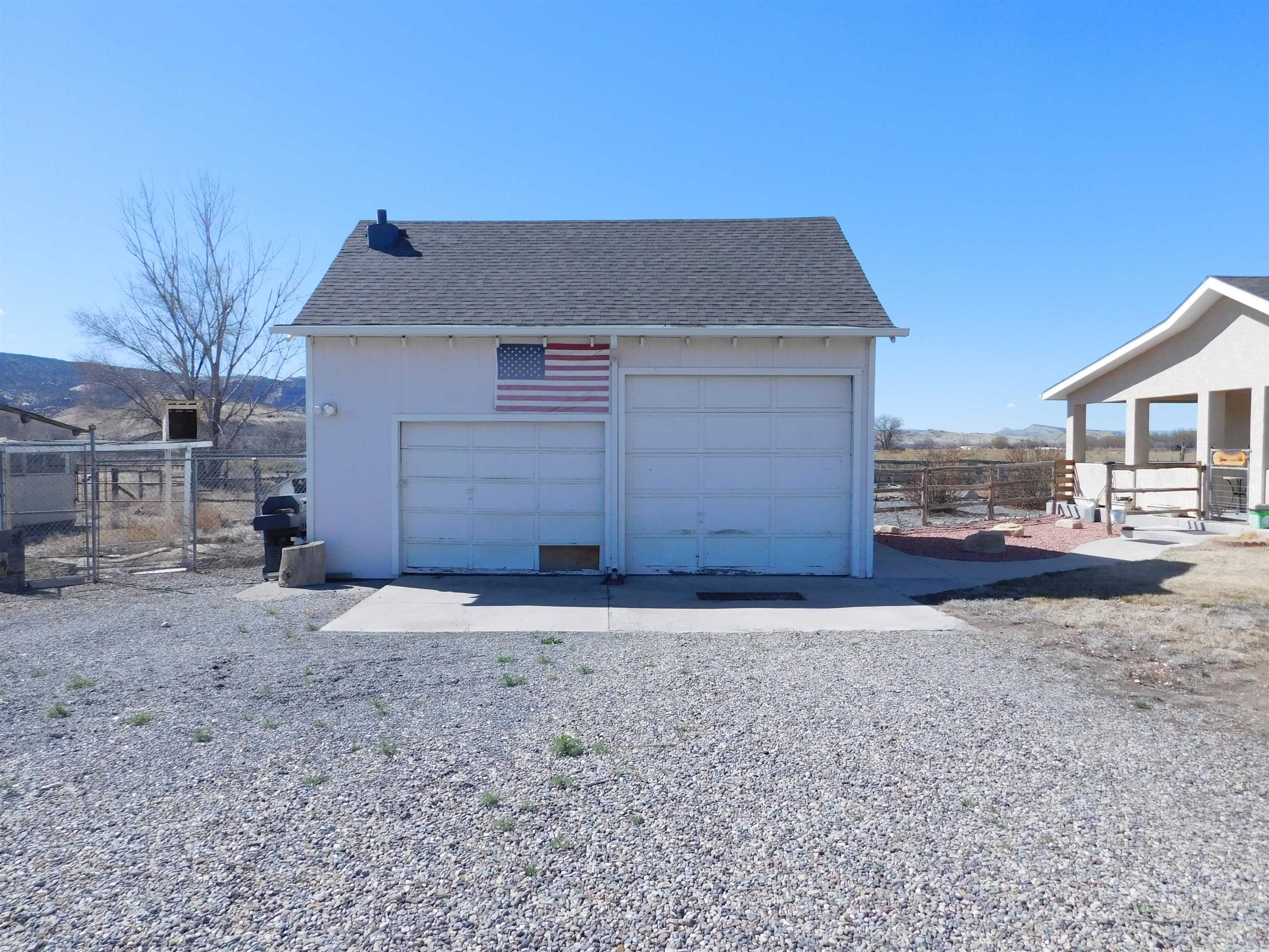 923 18 Road Fruita, CO 81521 - Photo 23 of 33 a front view of a house with a yard
