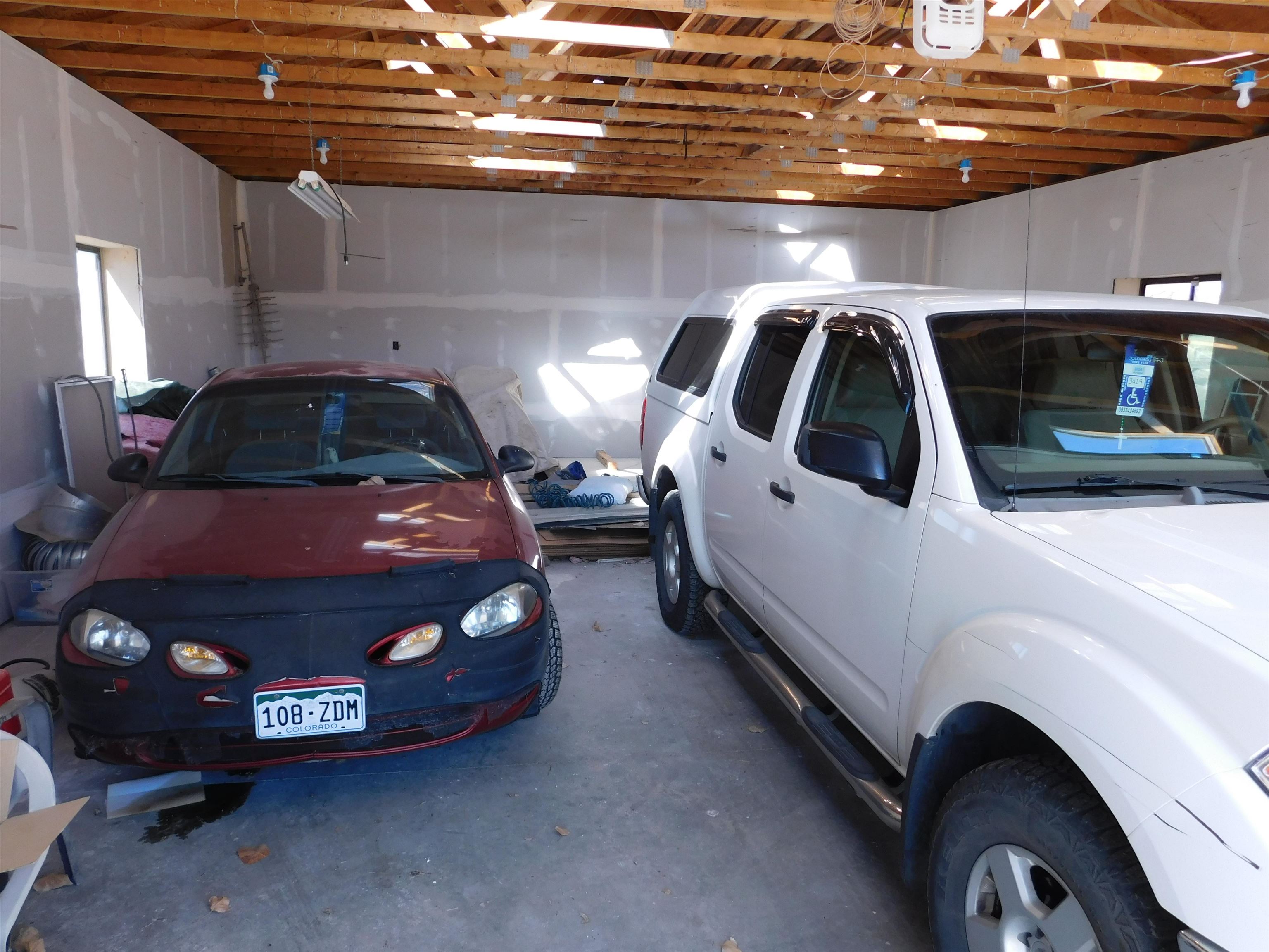 923 18 Road Fruita, CO 81521 - Photo 31 of 33 a car parked in a garage