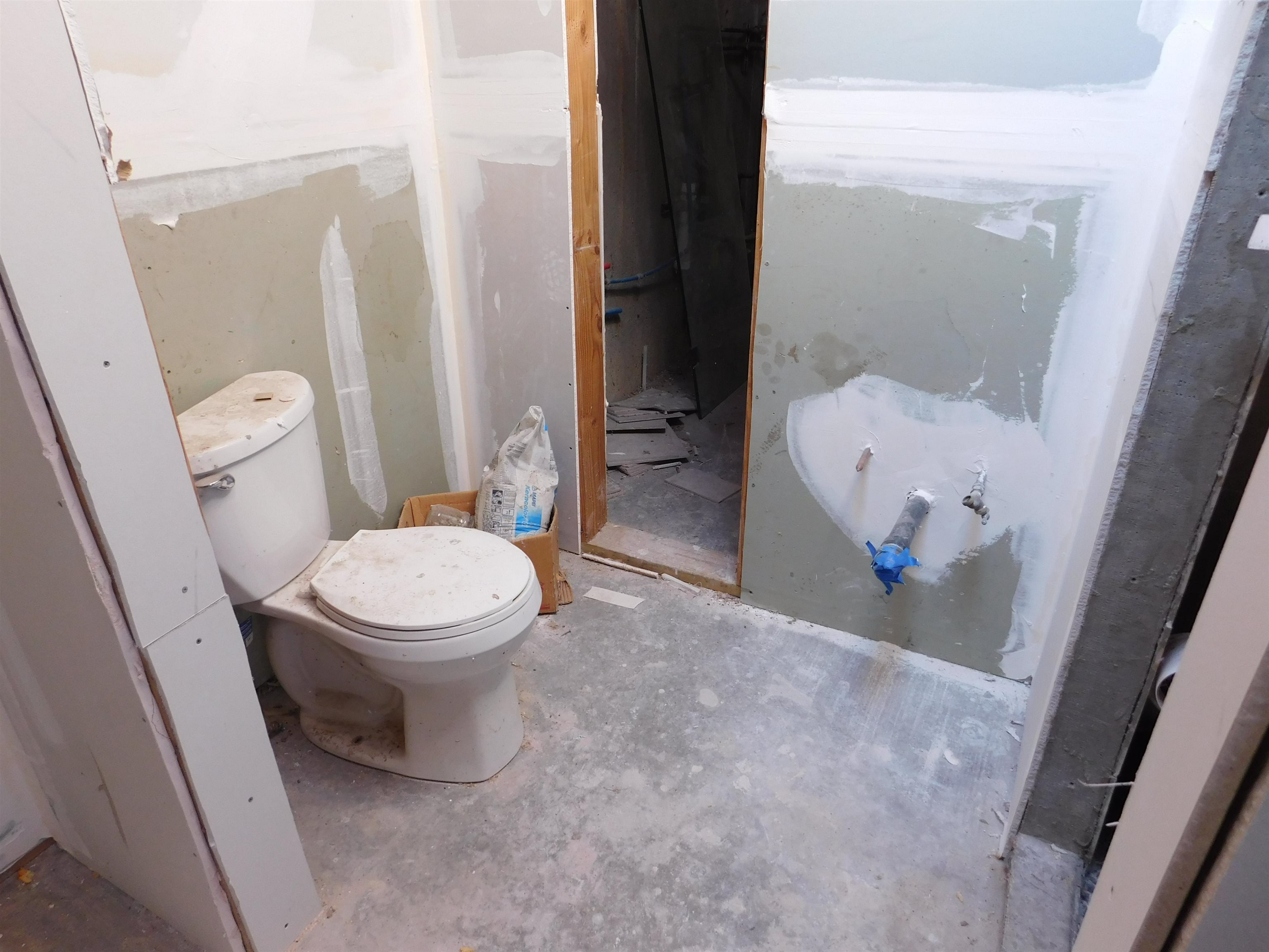 923 18 Road Fruita, CO 81521 - Photo 33 of 33 a white toilet sitting next to a bathroom sink
