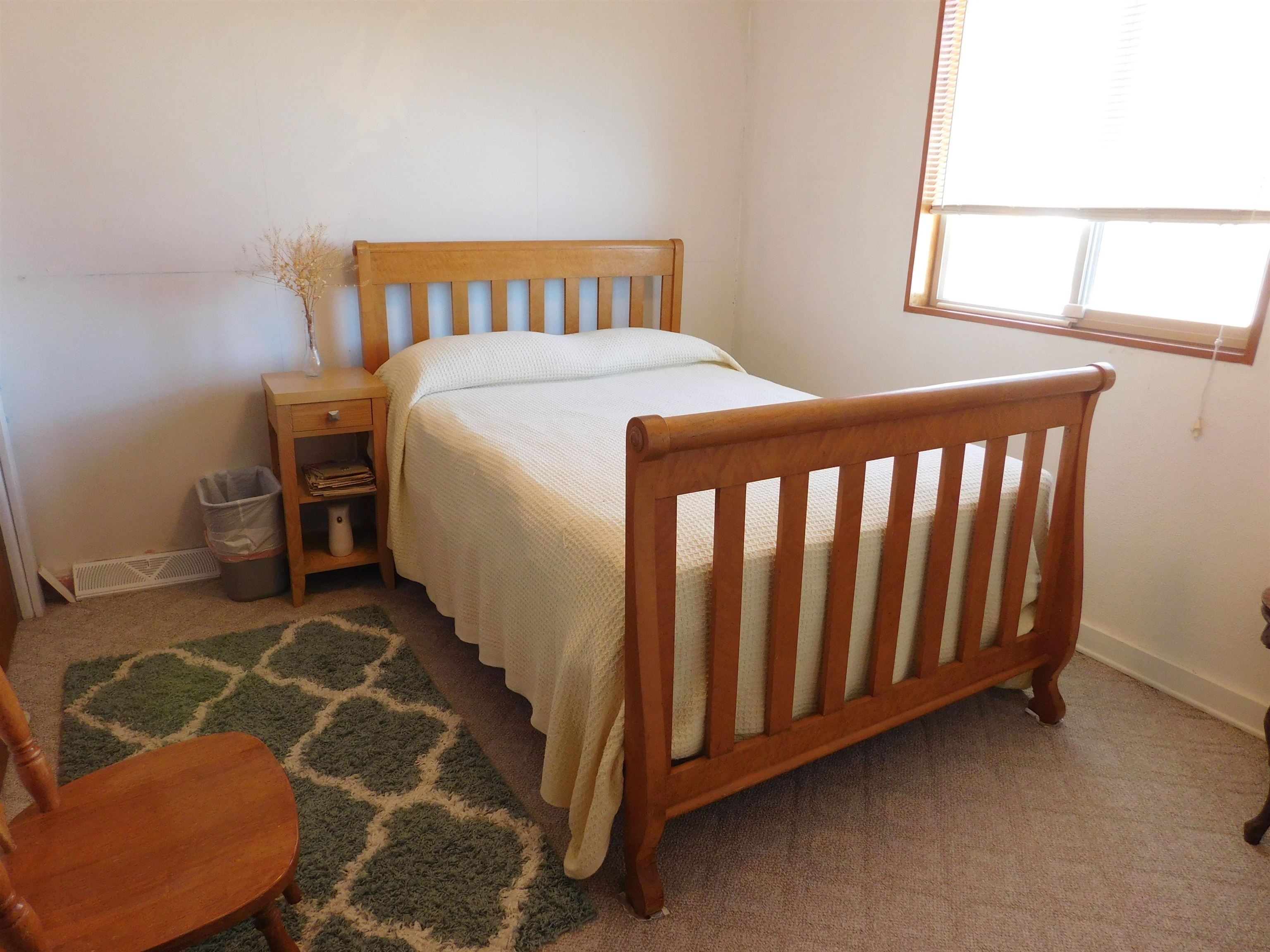923 18 Road Fruita, CO 81521 - Photo 10 of 33 a bedroom with a bed and a window