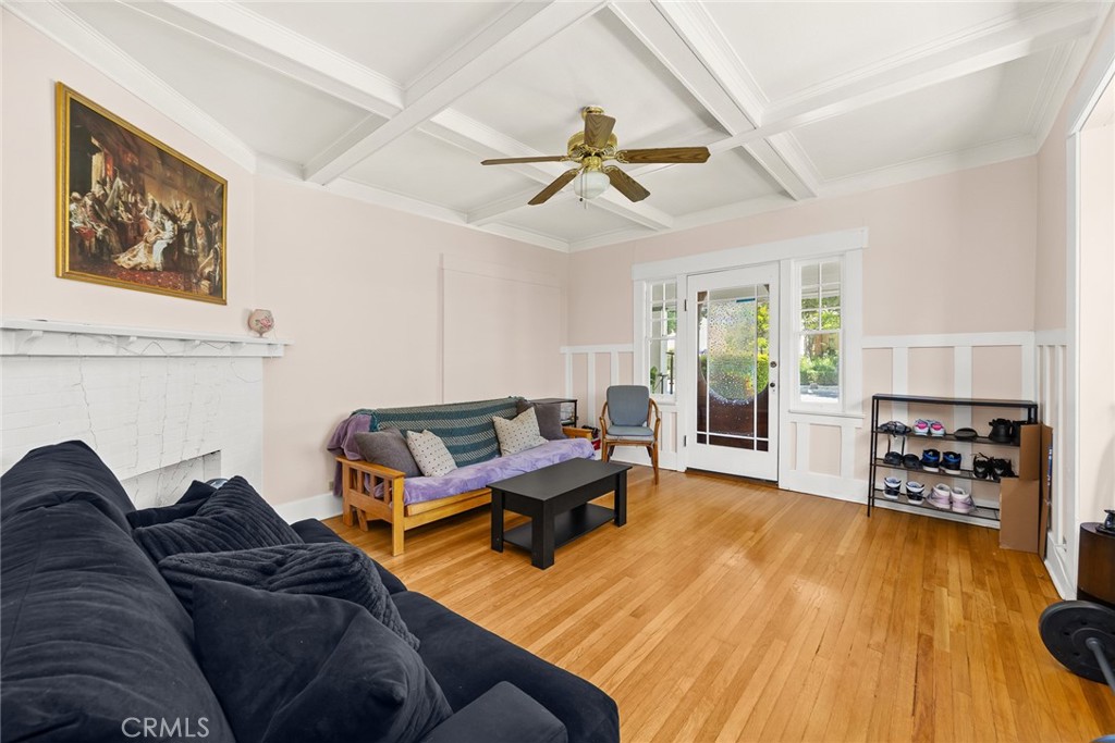 1156 Steuben Street Pasadena, CA 91106 - Photo 13 of 36 a living room with furniture and a wooden floor
