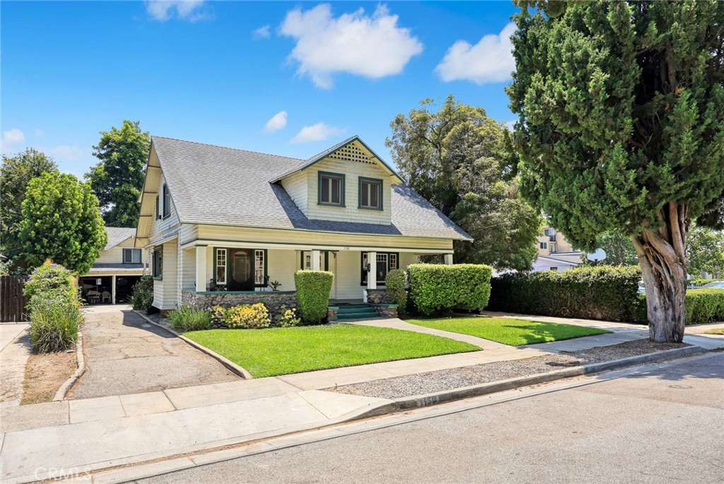 1156 Steuben Street Pasadena, CA 91106 - Photo 3 of 36 a front view of house with yard and green space