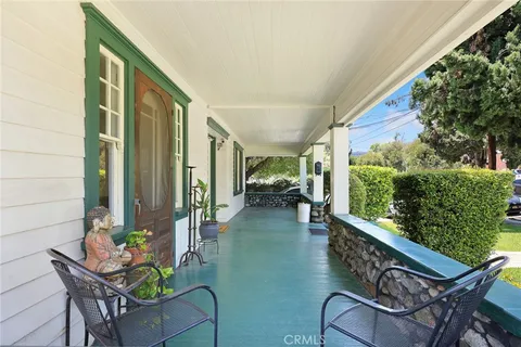 a view of livingroom with furniture and floor to ceiling window