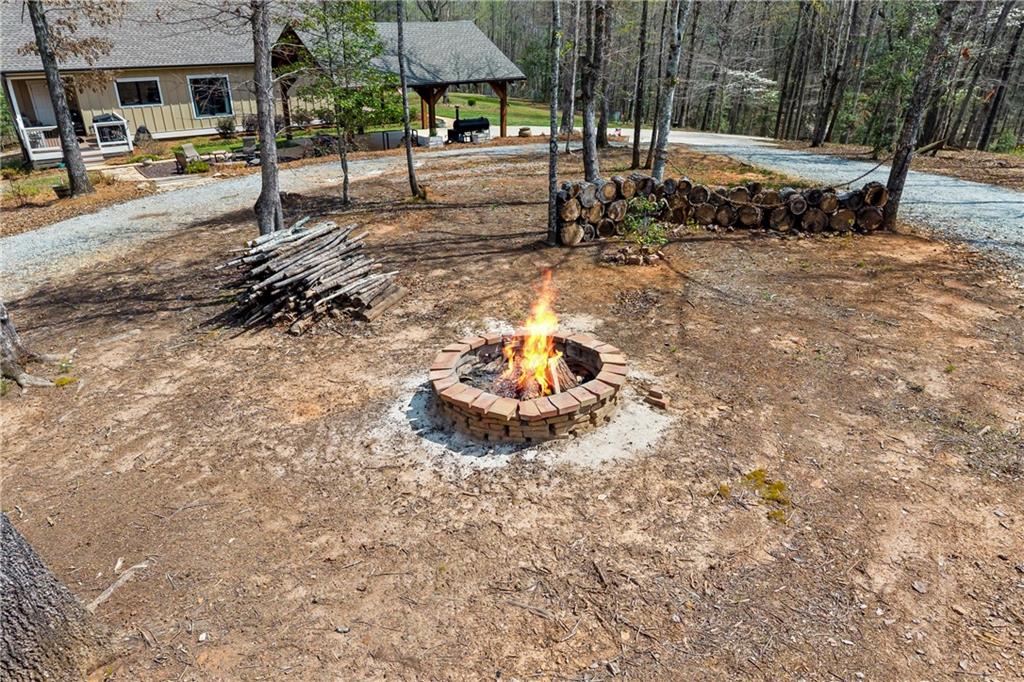 5240 Highway 17 Clarkesville, GA 30523 - Photo 14 of 82 a view of a backyard with sitting area