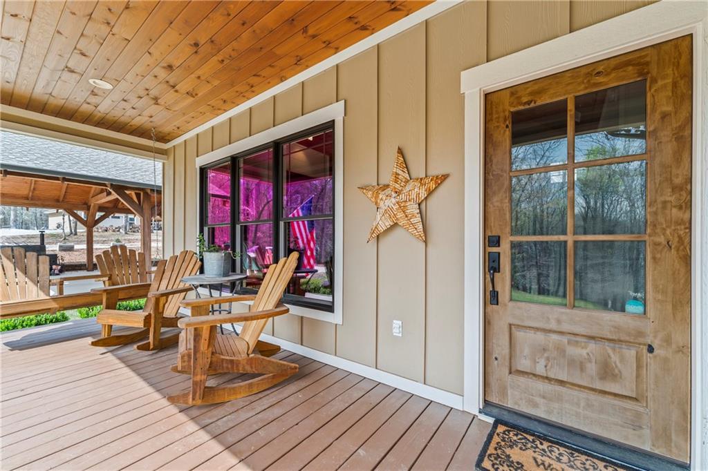 5240 Highway 17 Clarkesville, GA 30523 - Photo 20 of 82 a view of a chairs and table in th patio