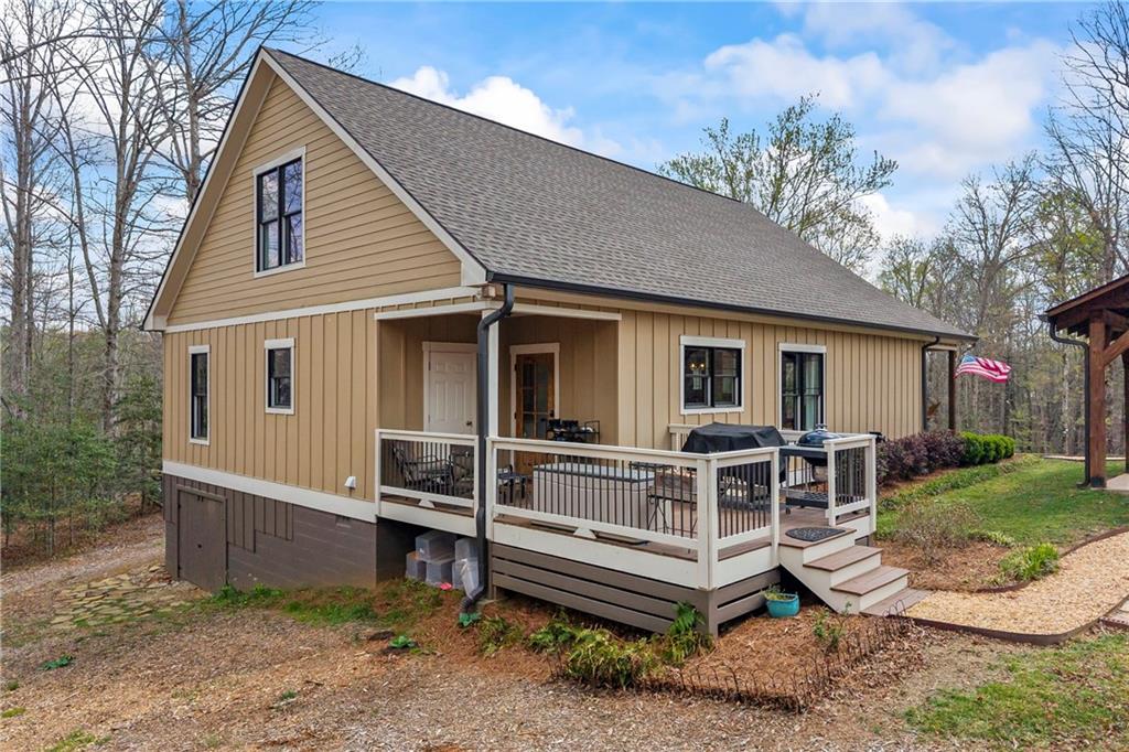 5240 Highway 17 Clarkesville, GA 30523 - Photo 6 of 82 a front view of a house with a yard