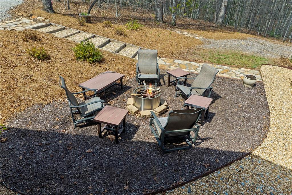 5240 Highway 17 Clarkesville, GA 30523 - Photo 8 of 82 a view of a backyard with table and chairs