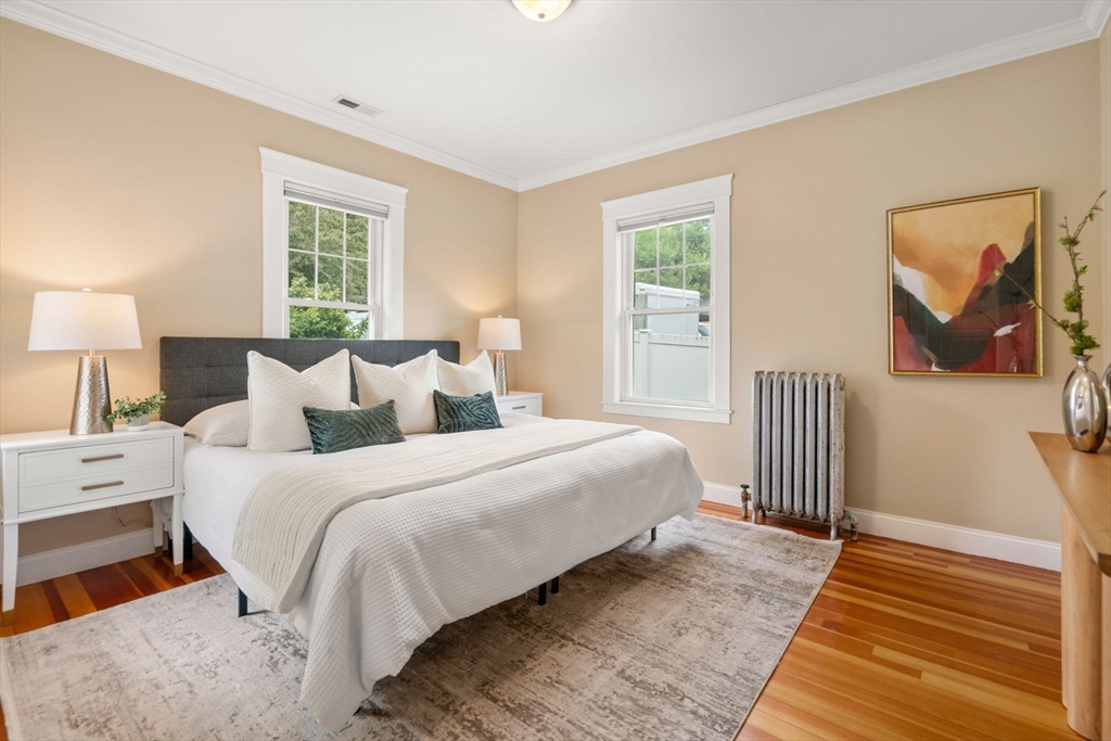 44 Norfolk Street Needham, MA 02492 - Photo 19 of 28 a bedroom with bed and a window