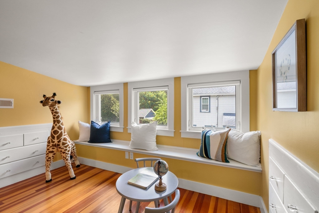 44 Norfolk Street Needham, MA 02492 - Photo 21 of 28 a living room with furniture and a large window