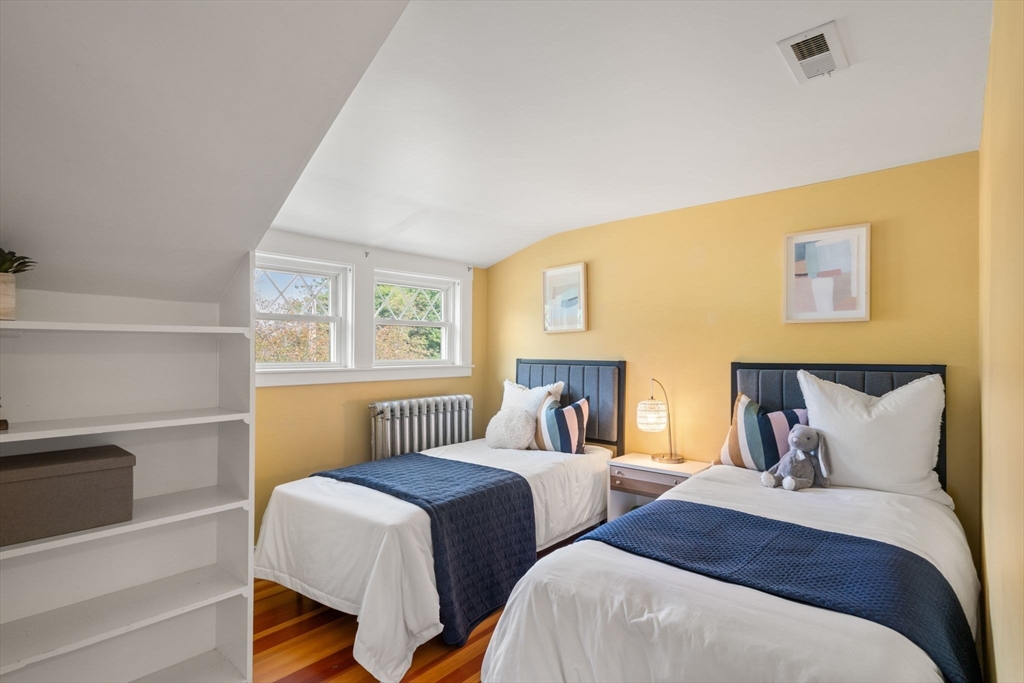 44 Norfolk Street Needham, MA 02492 - Photo 22 of 28 a bedroom with two beds and a window