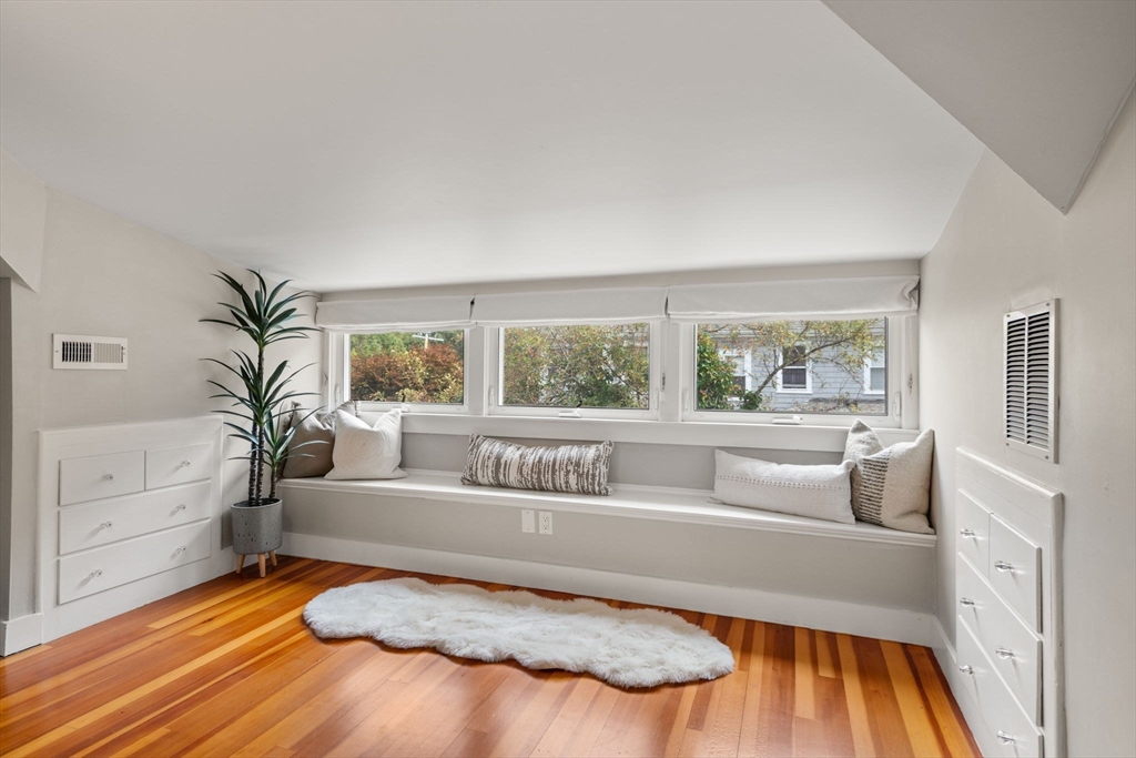 44 Norfolk Street Needham, MA 02492 - Photo 23 of 28 a living room with furniture and a large window